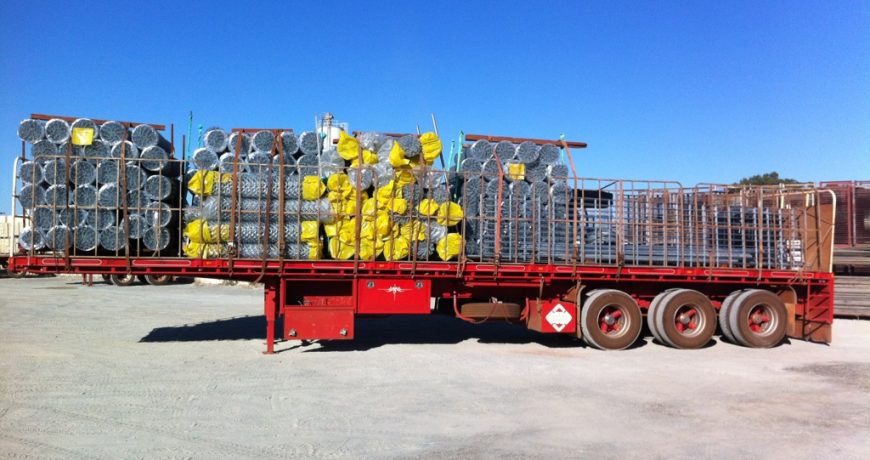 Truck with fencing material supplies